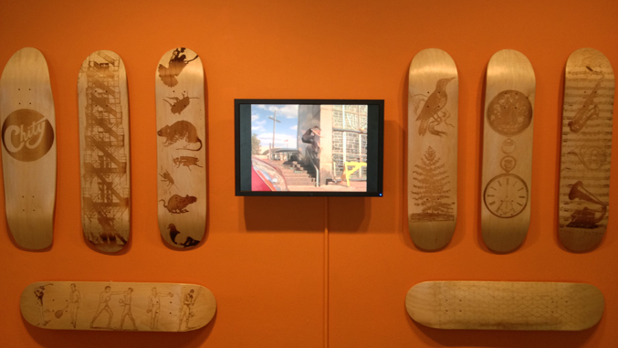 skateboards as art on wall