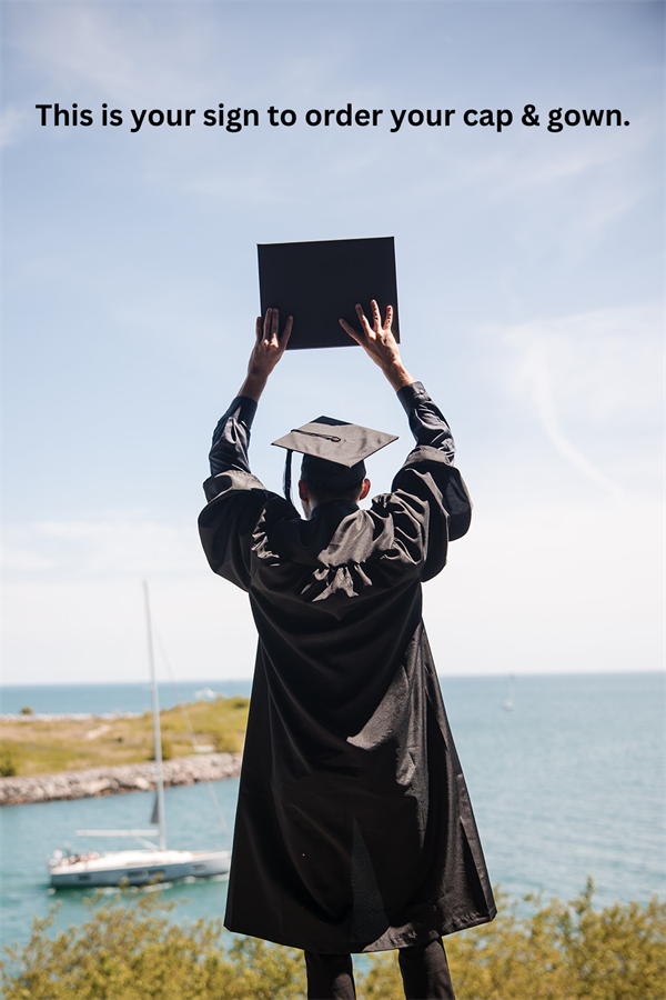 graduate holding sign