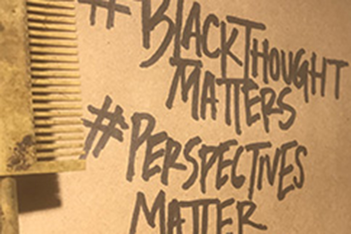 hashtag slogans written on wall in black paint