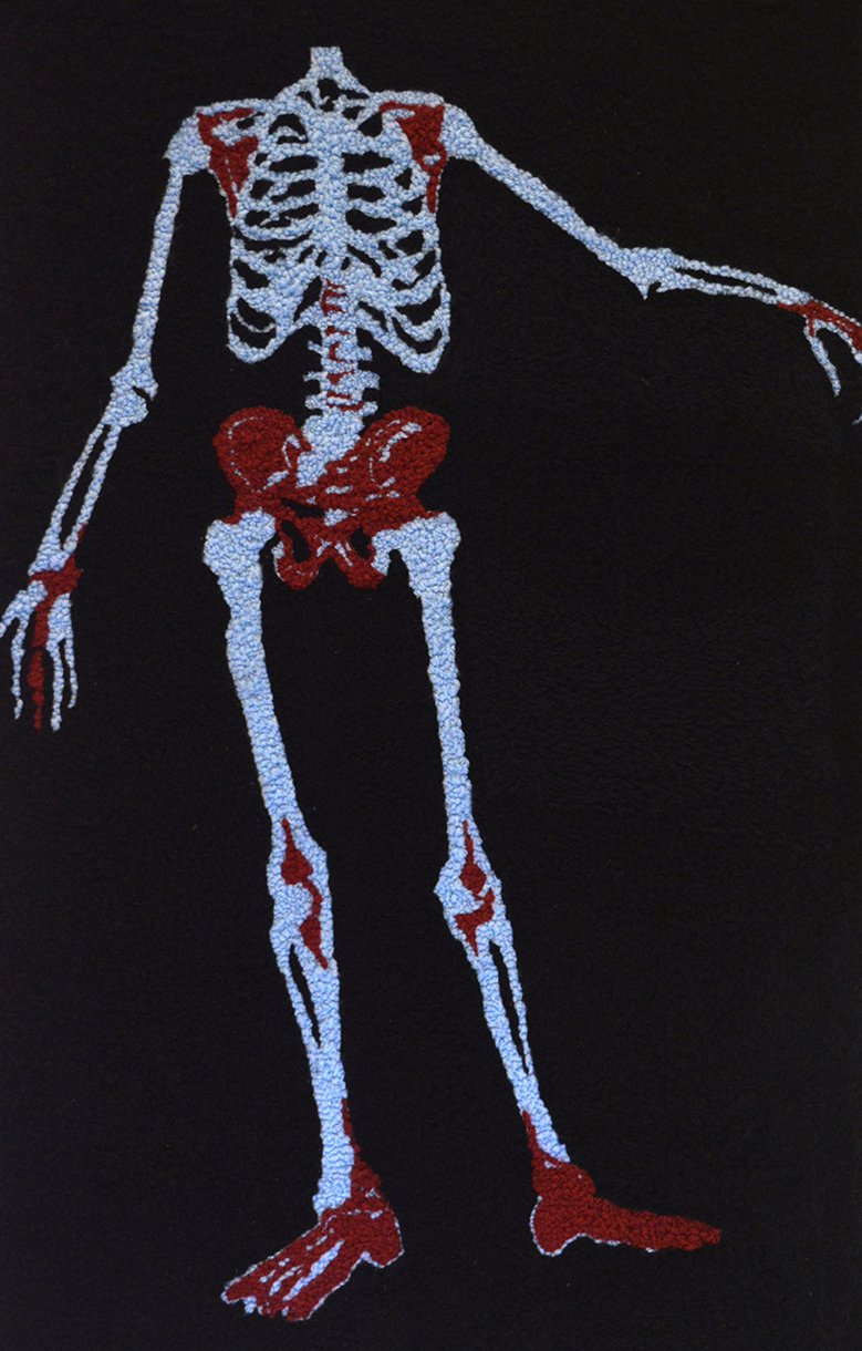 Textile piece with image of a human skeleton missing skull...in blue and red